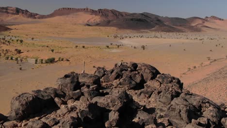 aerial circling over moroccan desert from top of mountain point of view