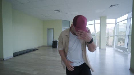 man breakdancing in modern studio