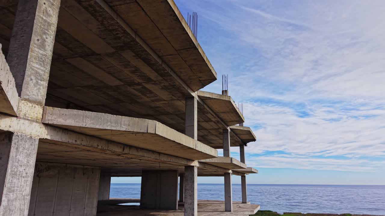 Abandoned aerial view of concrete structure against clear sky