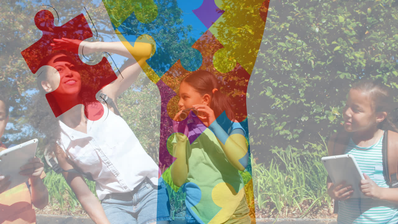 다채로운 퍼즐 조각의 애니메이션 리본 행복한 놀이 어린이 위에