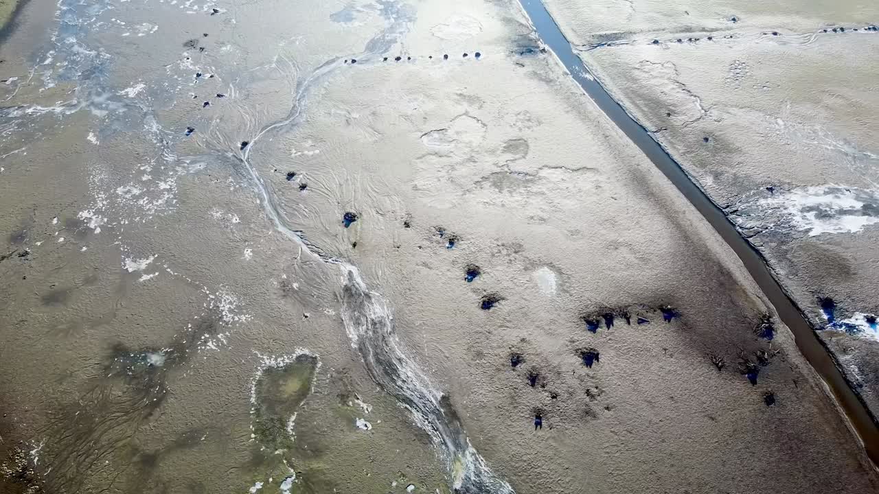 Aerial top view of Zovnek lake during dry season. Slovenia