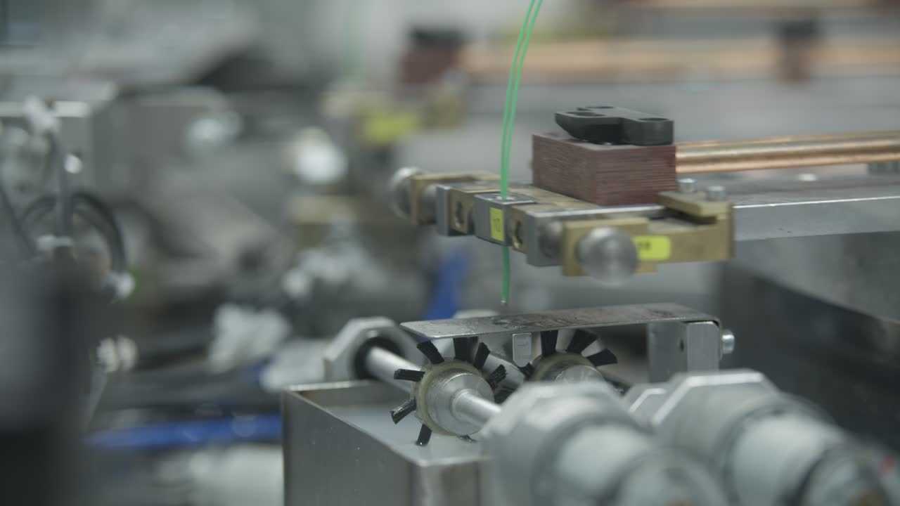 Automated unit assembling loaded temperature sensor cable components