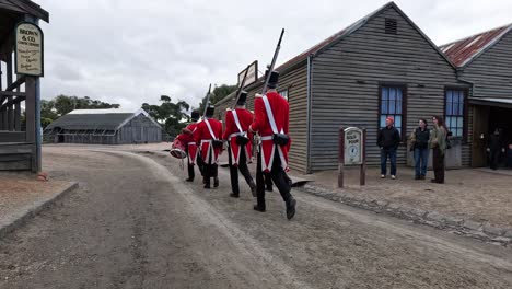 soldiers marching through historic town street