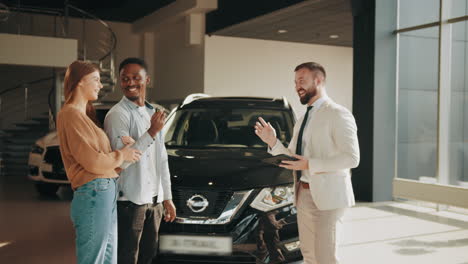 happy couple purchasing a car