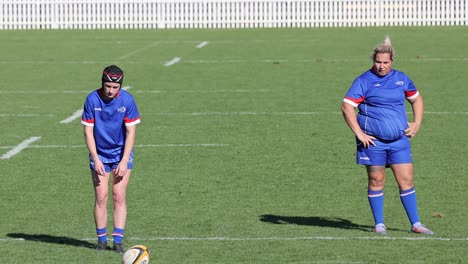 players preparing and practicing before a rugby match