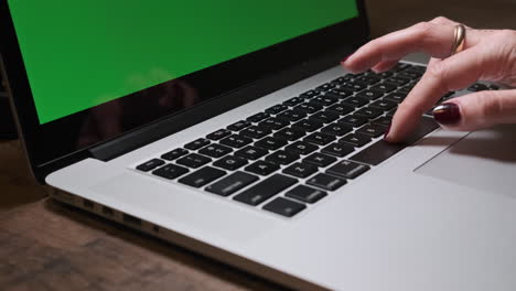 Woman-Hand-Typing-on-Laptop