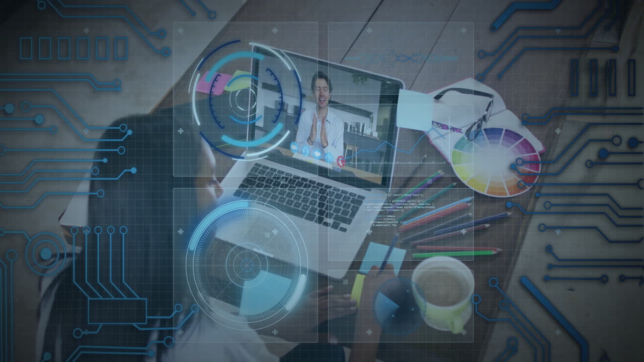 Digital interface animation over person working on laptop with colorful stationery