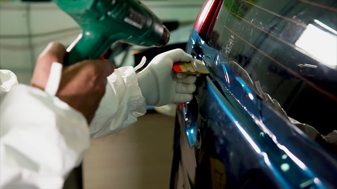 Applying Protective Film to Car