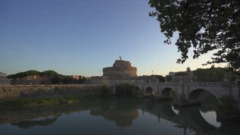 castel sant'angelo by the tiber river in the morning