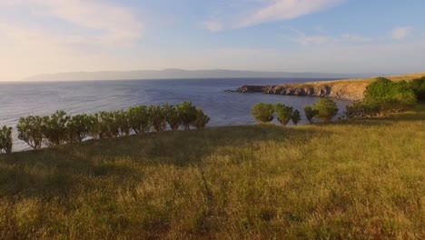 aerial: sunset at the cliffs of molyvos, lesbos