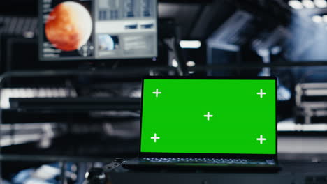 green screen laptop in spacecraft used for data input