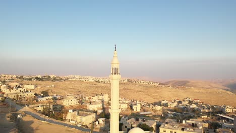 mosque tower minaret in palestine town, aerial view