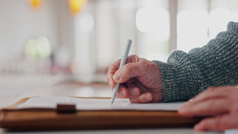 Elderly-man,-hands-and-writing-on-documents