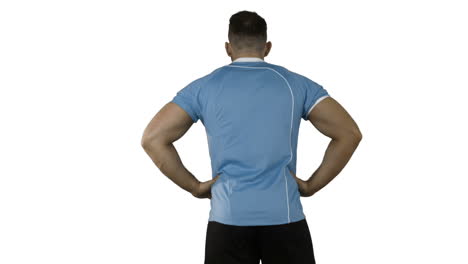 serious rugby player rear view