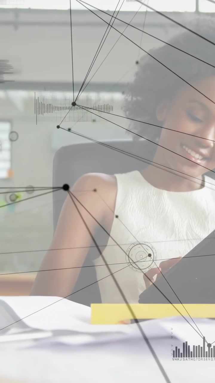 Vertical video: Looking woman in white top using black tablet, reviewing docs at office with HUD