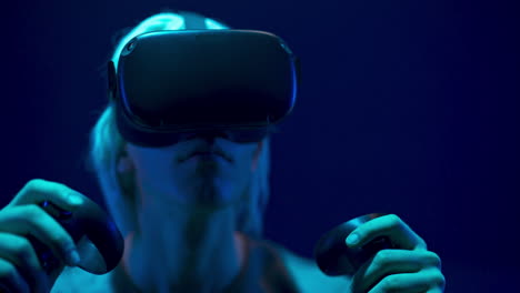 impressed man experiencing vr headset videogame neon background. future concept