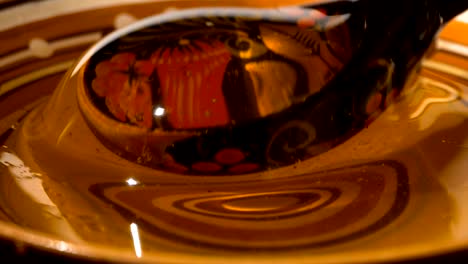 pouring honey. close-up of honey dripping