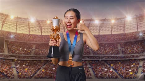 woman winner holding trophy in stadium