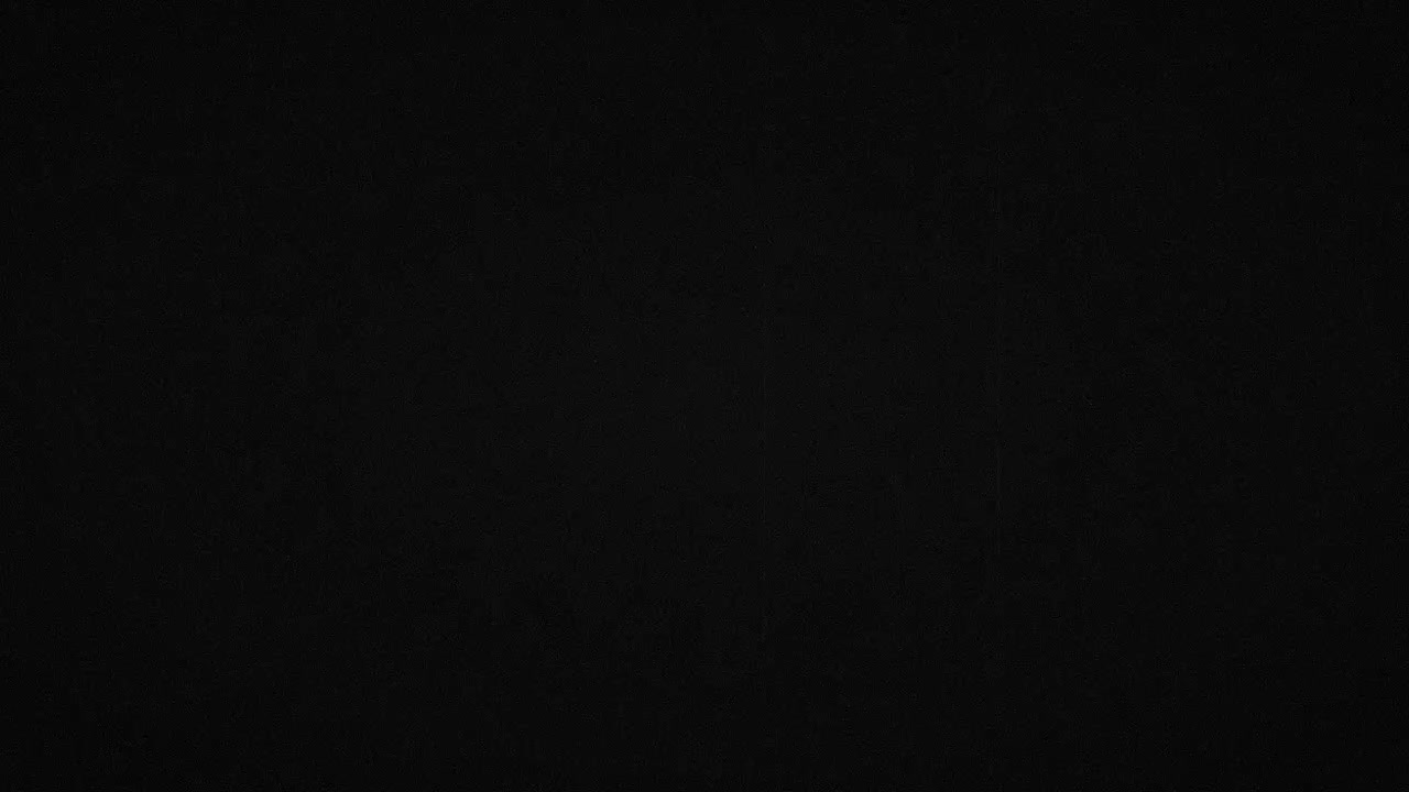 Sfondo nero con sottile texture a grana di pellicola