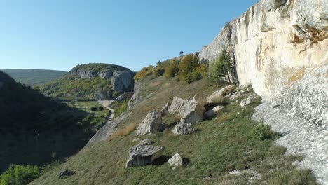 mountainous landscape with cliffs and valley