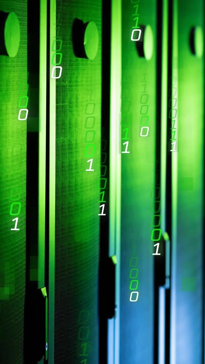 Animation of falling binary codes over sever racks in server room
