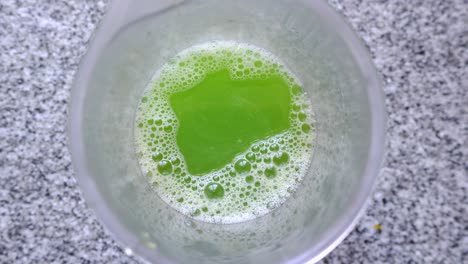 Top-View-Of-Nutritious-Green-Juice-In-A-Glass