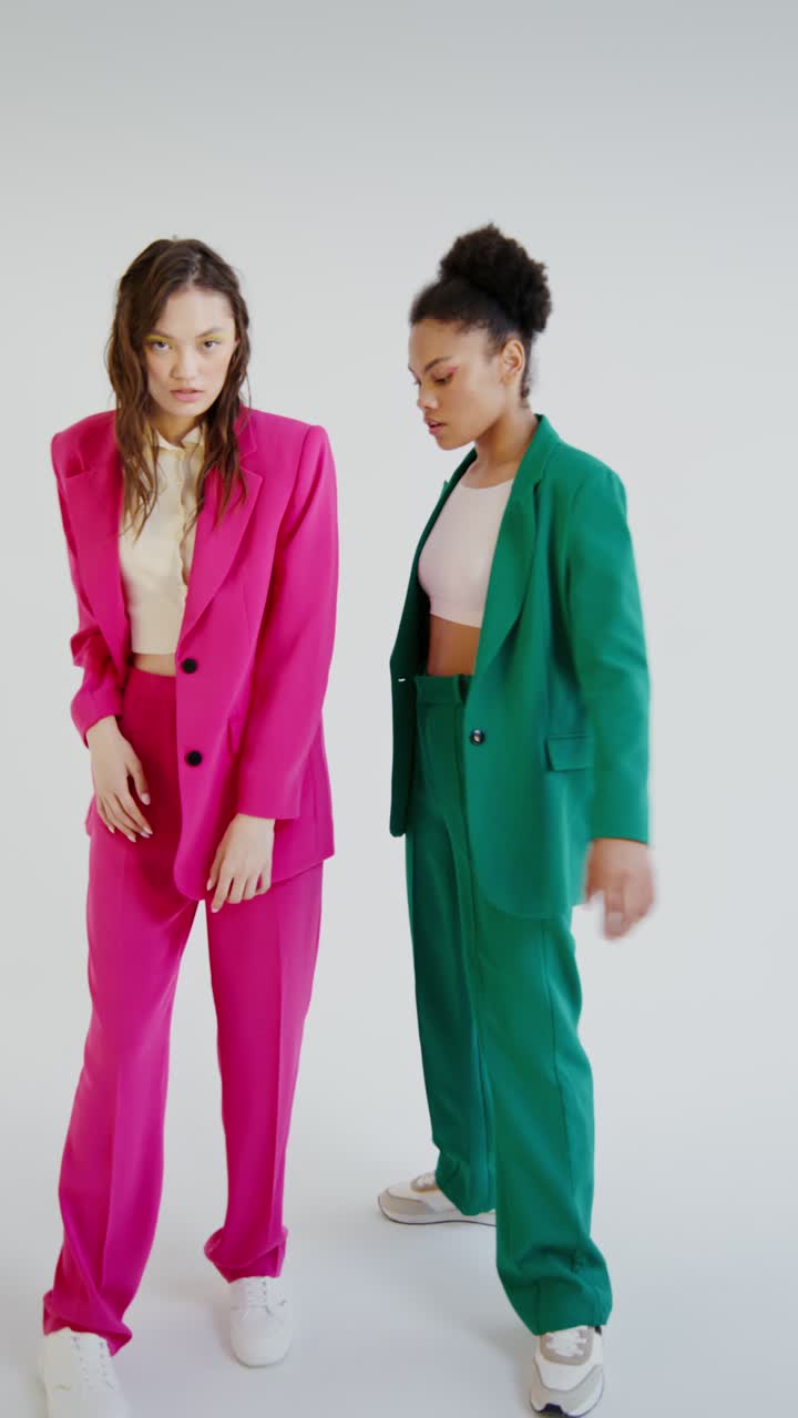 Fashionable Women in Brightly Colored Suits