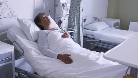 woman lying in a hospital bed 4k