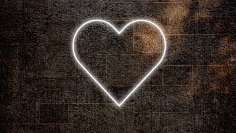 signo de corazón de neón en la pared de ladrillo 4k