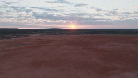 drone clip moving forwards beautiful sunrise over colourful outback desert in western australia