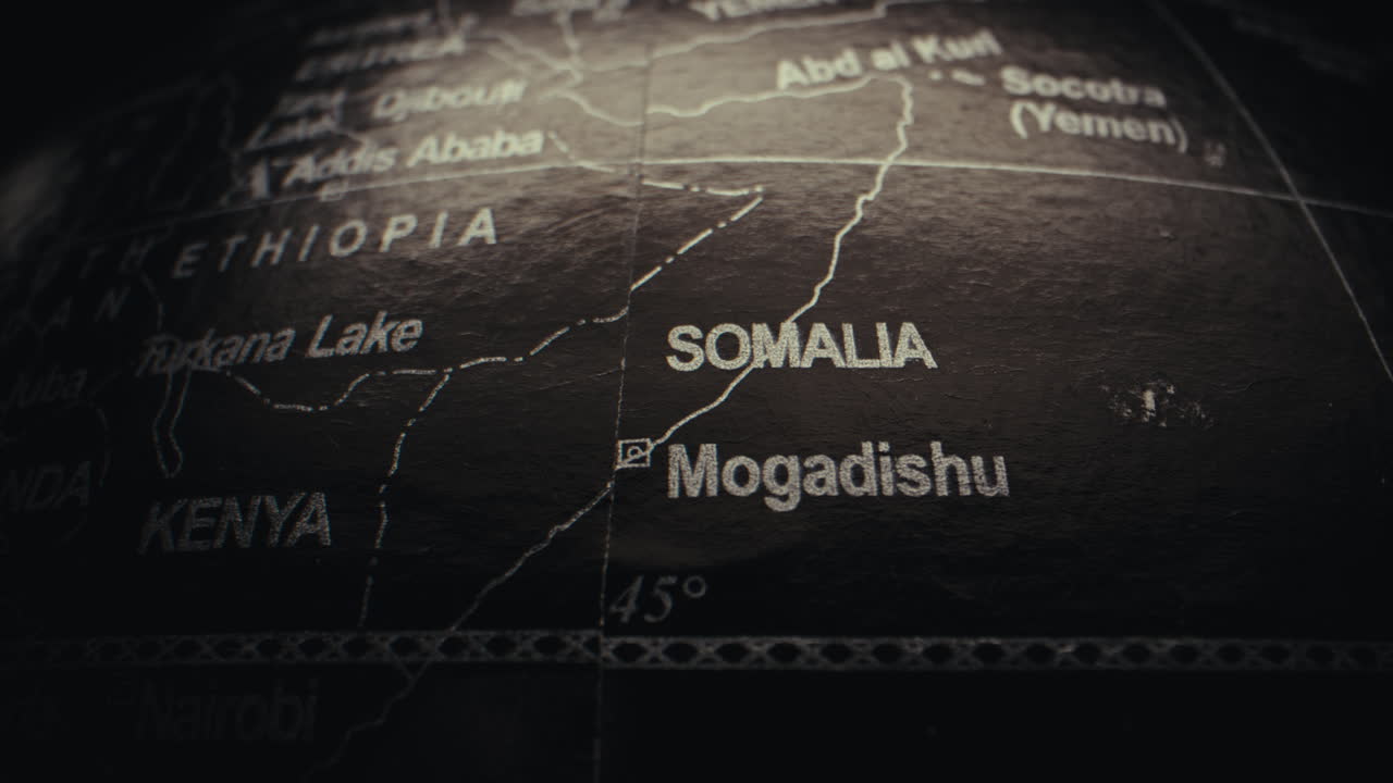 Close-up of a World Globe highlighting Somalia and Mogadishu
