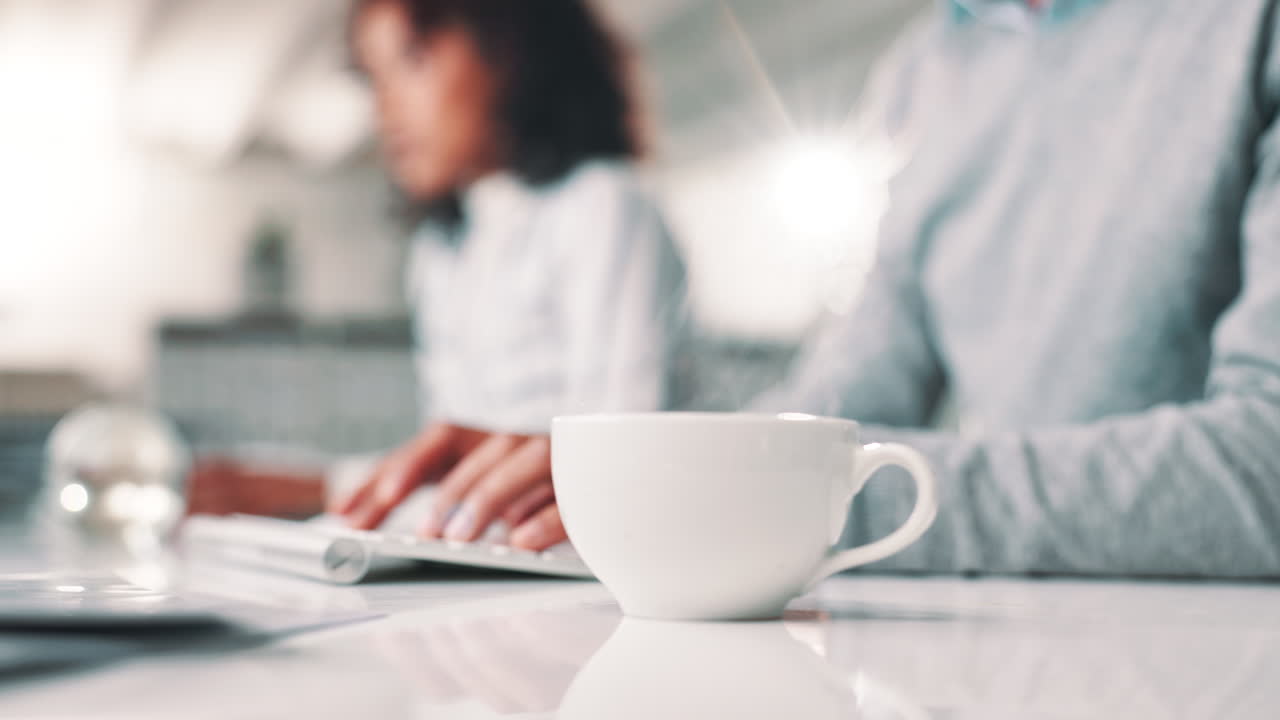 People working in the office with coffee