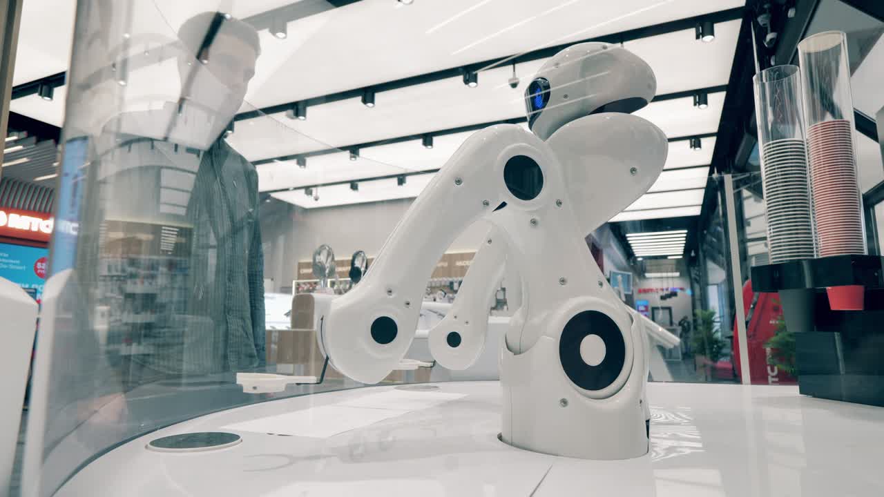 Bionic barista in a waiting mode in a coffee shop