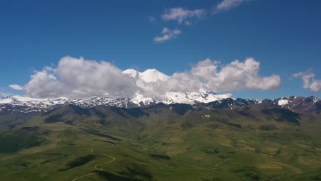 Elbrus-Region.-Flying-over-a-highland-plateau.-Beautiful-landscape-of-nature.-Mount-Elbrus-is-visible-in-the-background.