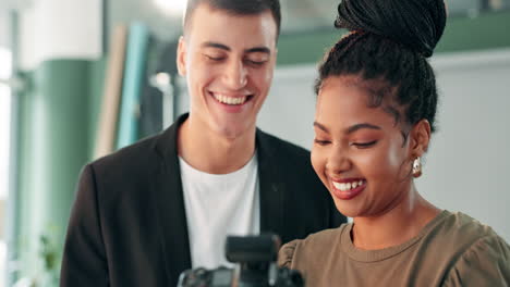 photographer and model reviewing photos
