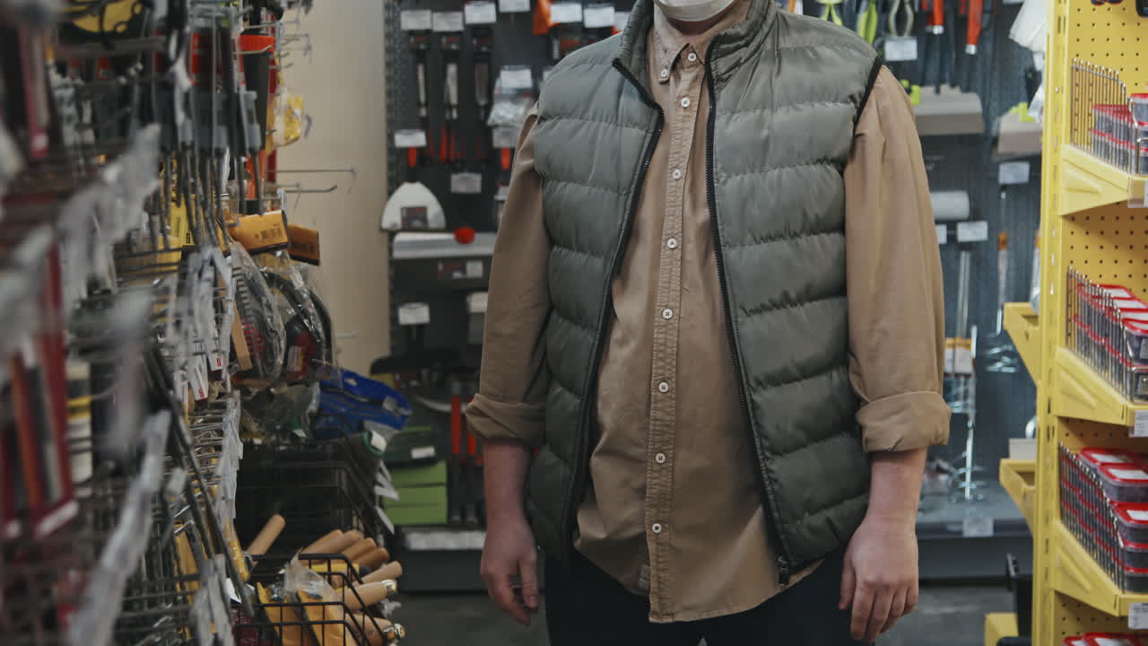 Portrait of Man in Face Mask at Hardware Store