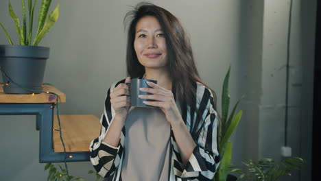 woman enjoying coffee at home