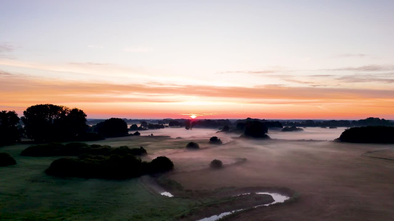 Beautiful Sunrise Landscape with Fog