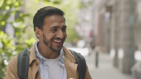 close up of muslim couple on date meeting on city street 3