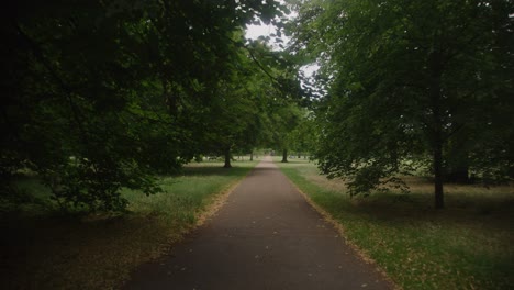 Wide-shot-of-path-in-green-park-in-central-London