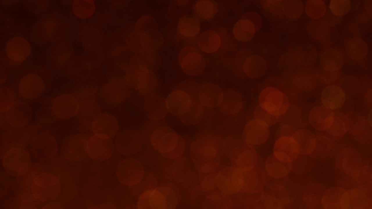 pequeños círculos y abstracto formado a partir de macro tiro de brillos rojos