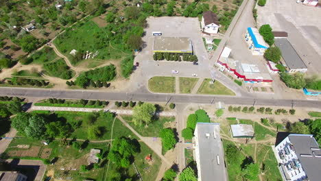 green territory in the town near rural countryside. beautiful daytime footage from aerial perspective.