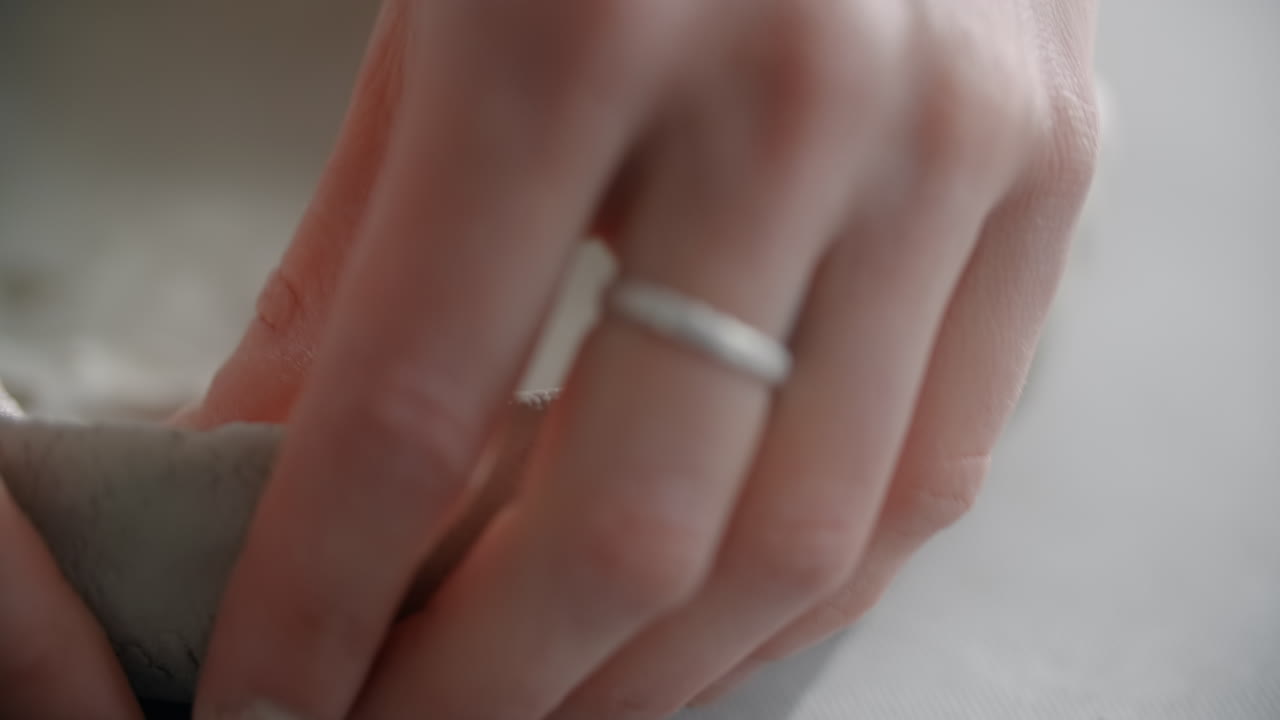 Hands working with clay