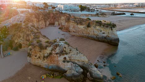 stunning aerial view of coastal cliffs and sandy beach in portugal