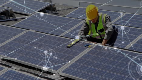 Technician-installing-solar-panels-with-network-connections-animation-over-scene