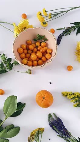 fresh fruit and flower arrangement