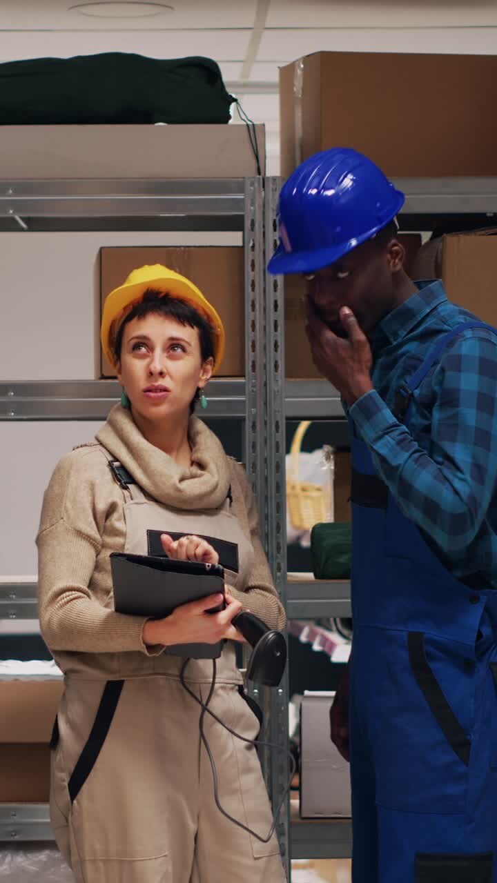 Vertical video: Diverse team of employees using tablet to scan products