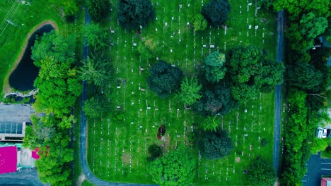 flyover top down aerial of diamond lake cemetery on townline rd, mundelein, illinois usa 60060