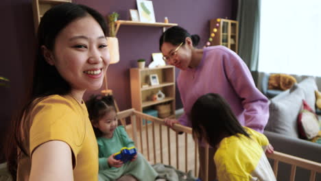 asian babies in a crib