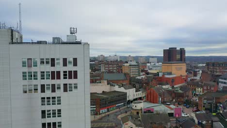 Aerial-views-of-the-main-town-in-the-potteries-Stoke-on-Trent,-Hanley-the-city-centre-with-high-rise-buildings-and-a-beautiful-city-landscape,-immigration-housing-and-high-rise-flats